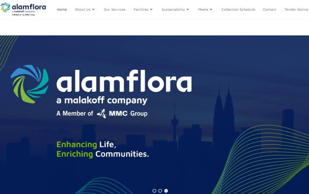 Tangkapan skrin halaman utama tapak web Alam Flora, menunjukkan logo syarikat, 'a malakoff company' dan 'A Member of MMC Group', pada latar belakang biru tua dengan bayang bandar