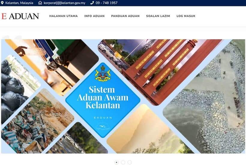 Tangkapan skrin halaman utama laman web E-ADUAN (Sistem Aduan Awam Kelantan), memaparkan grafik berlian biru di tengah dengan teks "Sistem Aduan Awam Kelantan" dan lambang negeri Kelantan, dikelilingi oleh kolaj imej yang lebih kecil yang menunjukkan pelbagai isu awam