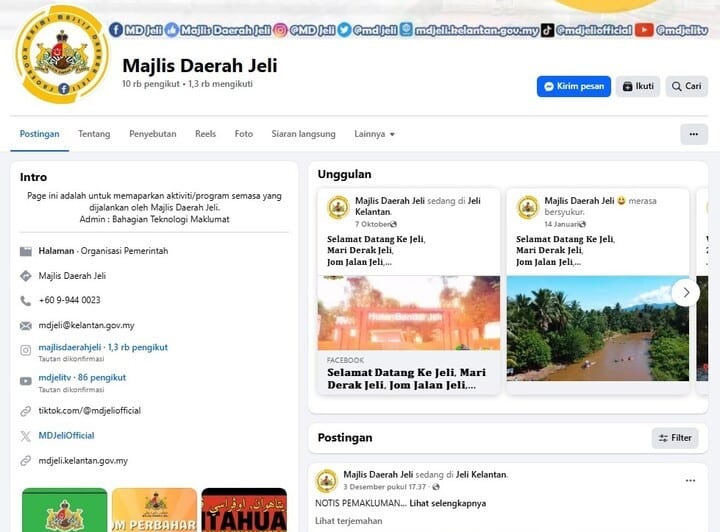 Tangkapan skrin laman Facebook rasmi Majlis Daerah Jeli, menunjukkan gambar profil, nama, bilangan pengikut (10 'followers' dan 1.3 ribu 'following'), serta bahagian Posts, About, Reels dan Photos, berserta butiran hubungan dan siaran terbaru yang mempromosikan Jeli