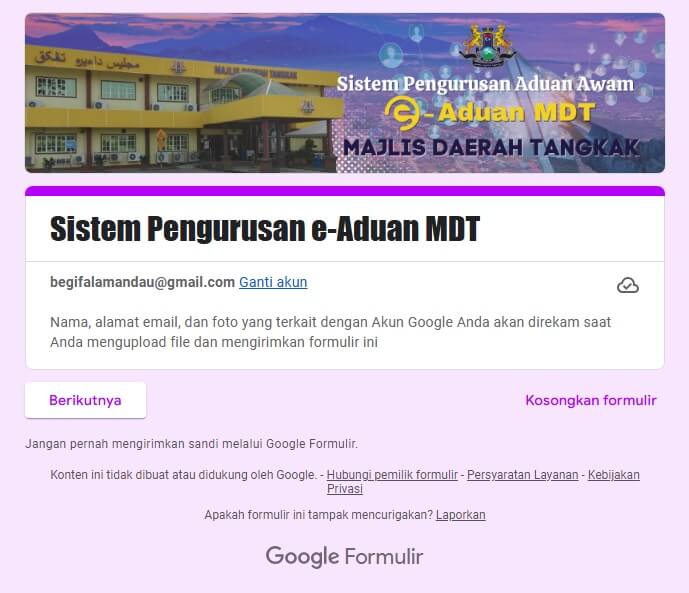 Petikan skrin Borang Google Sistem Pengurusan Aduan Awam e-Aduan MDT, menunjukkan bangunan MDT, tajuk sistem, akaun Google yang dilog masuk dan butang "Seterusnya/Berikutnya"