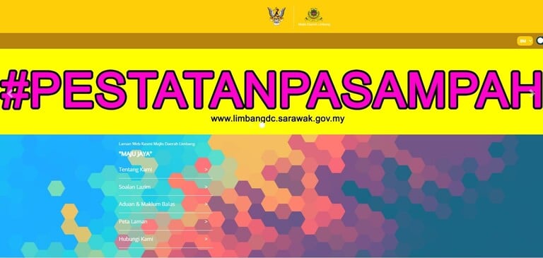 Laman utama laman web rasmi Majlis Daerah Limbang memaparkan sepanduk kuning besar dengan hashtag #PESTATANPASAMPAH dalam teks merah jambu, URL laman web dan menu navigasi di atas latar belakang corak heksagon berwarna-warni